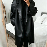 Effortless Black Faux Leather Trench Coat for Women with Notched Lapel Long Sleeve Oversized Double Breasted Style