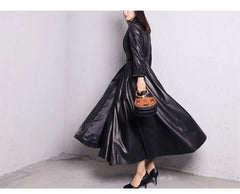 Elegant Black Faux Leather Maxi Trench Coat for Women with Notched Lapel Long Sleeve Belted Flared Style