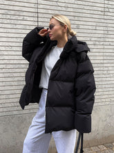 Cozy Black Hooded Puffer Jacket for Women with Zip Front Side Pockets Oversized Insulated Winter Style